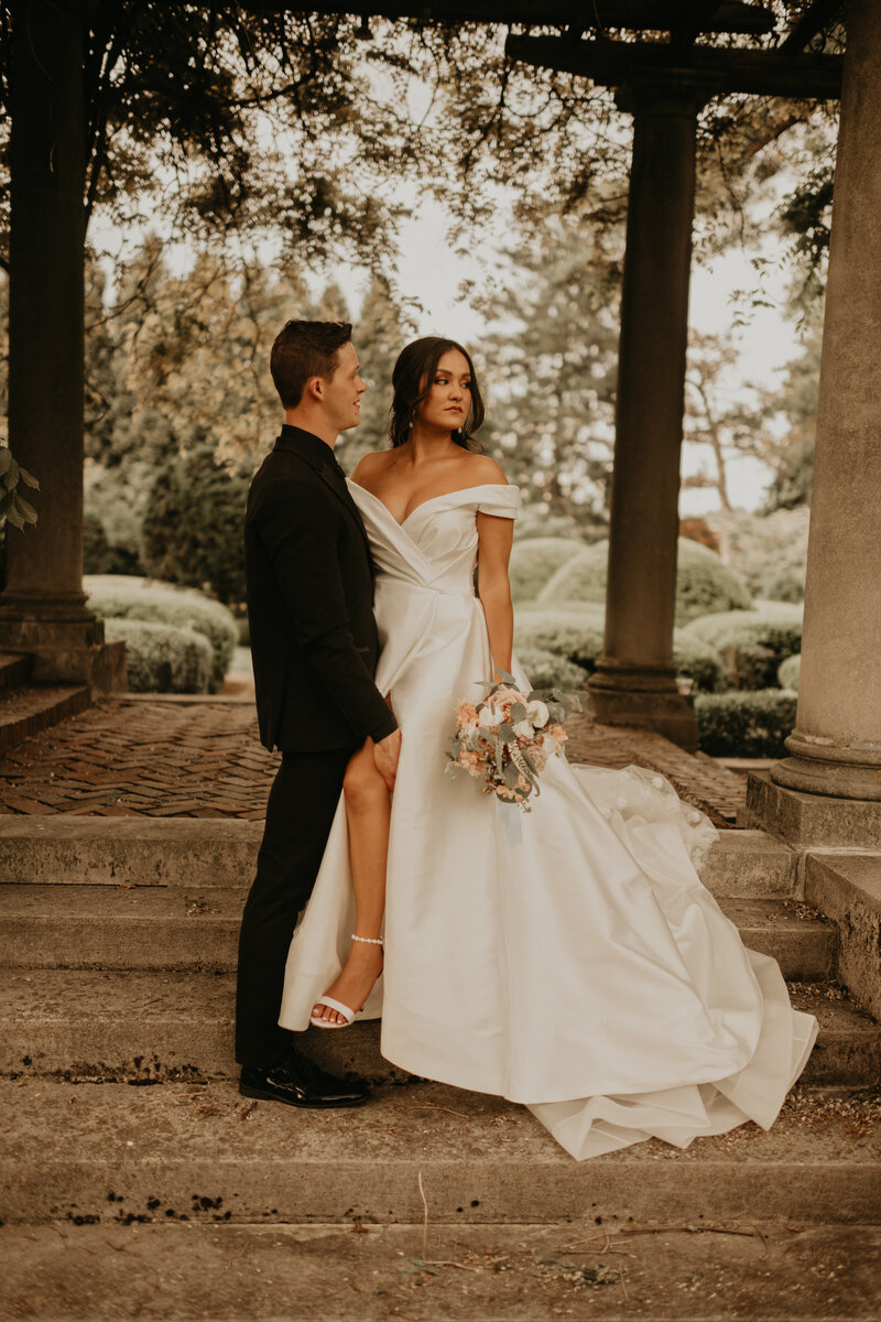 bride and groom on staircase