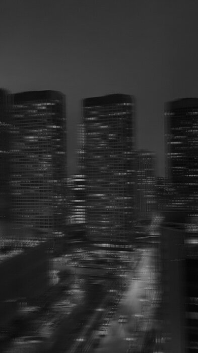 city skyline at night blurred