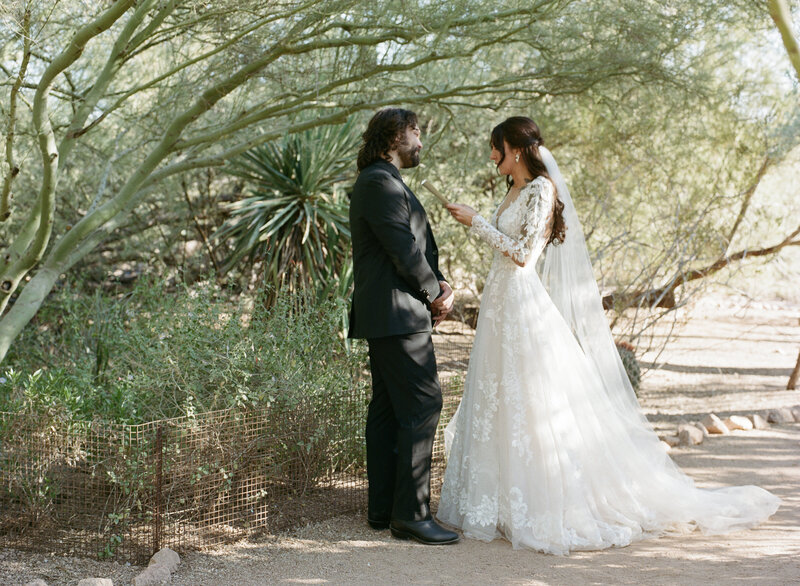 bride shares private vows with groom under a tree in phoenix arizona