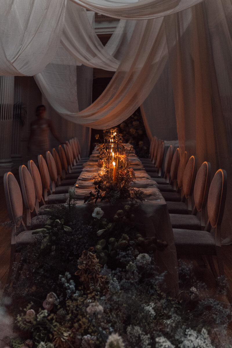 A wide angle shot of a luxury dinner table set up at Hedsor house cotswolds