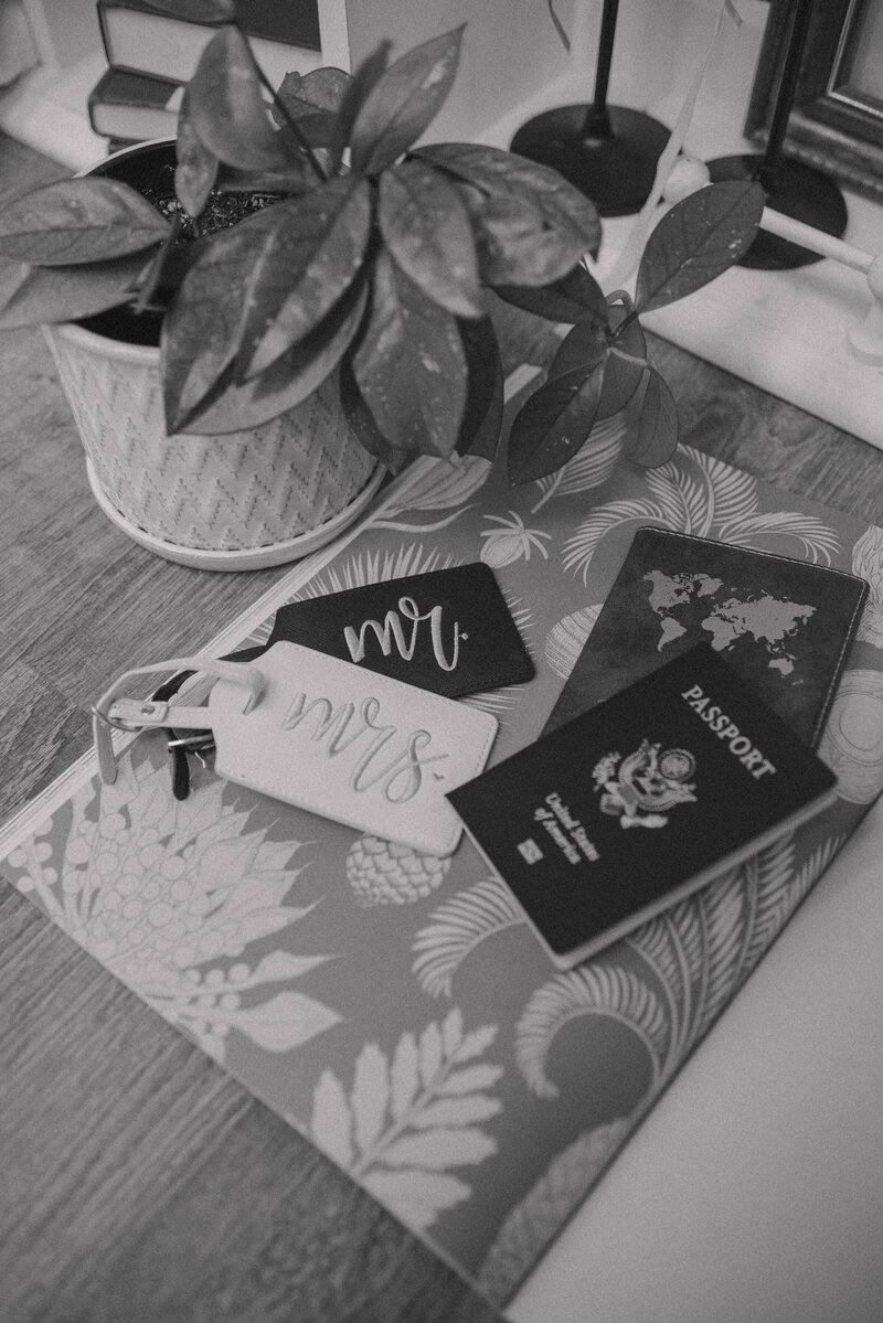 Mr and Mrs travel tags with a passport.