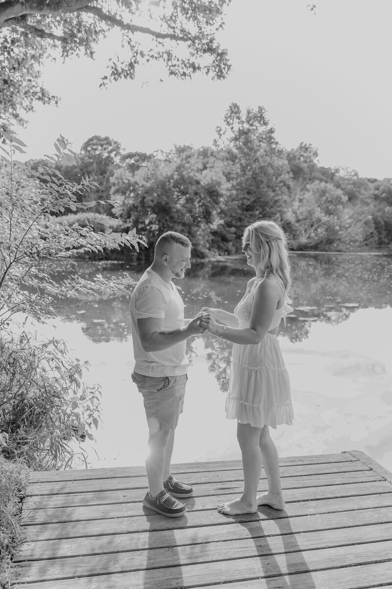 Surprise engagement proposal on the banks of the Shenandoah River in Virginia, with stunning waterfront views at sunset