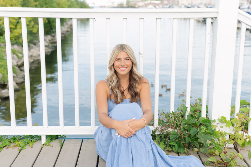 girl in light blue dress on the water at Edgewater yacht club, cleveland ohio