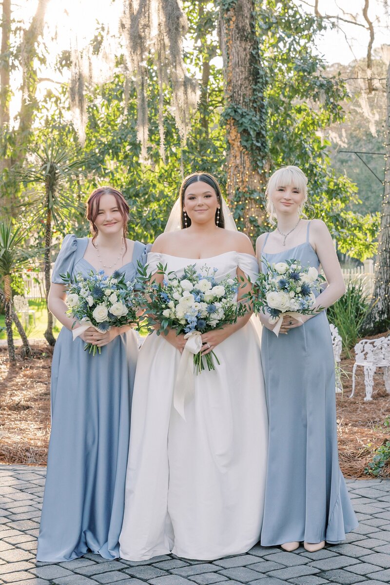 wedding bride and groom savannah georgia bridesmaids bouquet purple