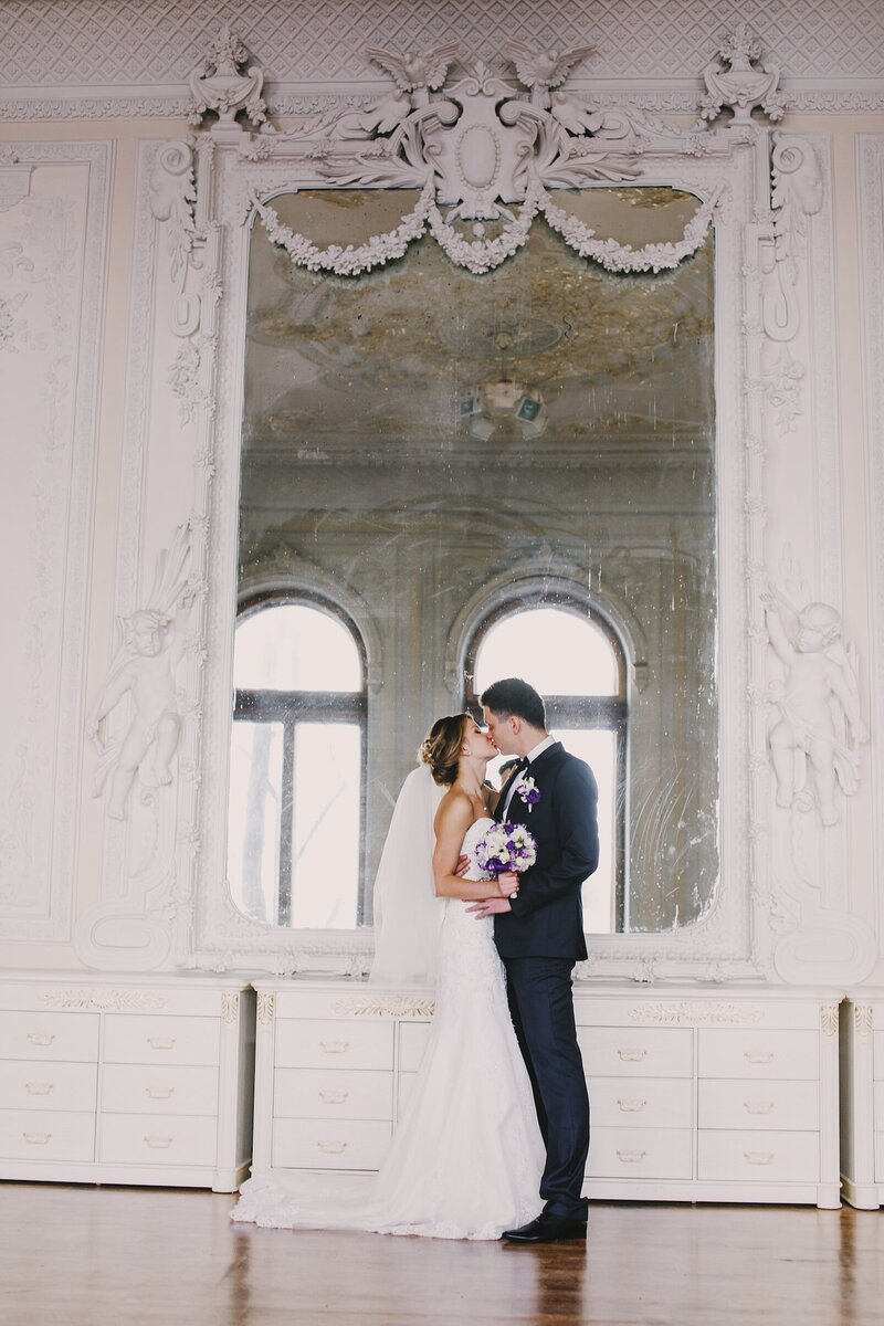 Bride and Groom share a kiss in English Stately Home Bridgerton Elopement