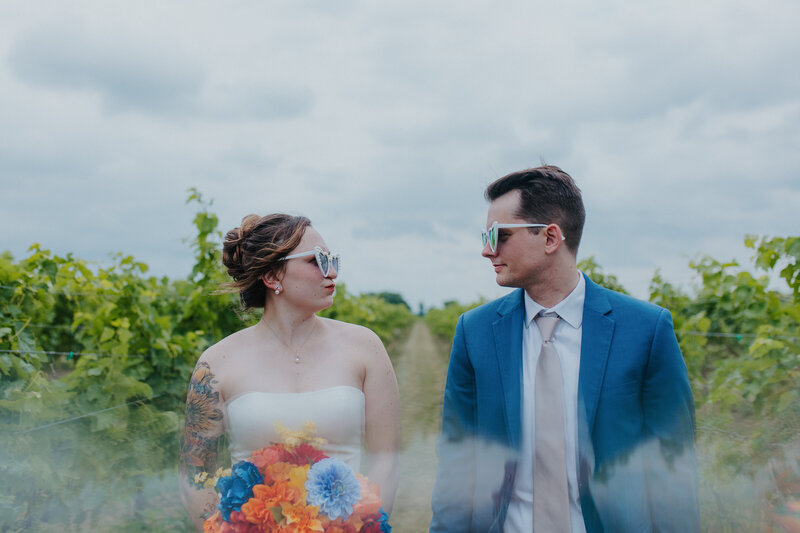 lancaster pa photographers wedding portraits ideas bride and groom silly photo in sunglasses colorful wedding bouquet tattooed bride blue wedding suits lancaster pa wedding venues photo by Emily Avila, the anti-awkward, fun-loving, love-affirming wedding photographer of Central Pennsylvania
