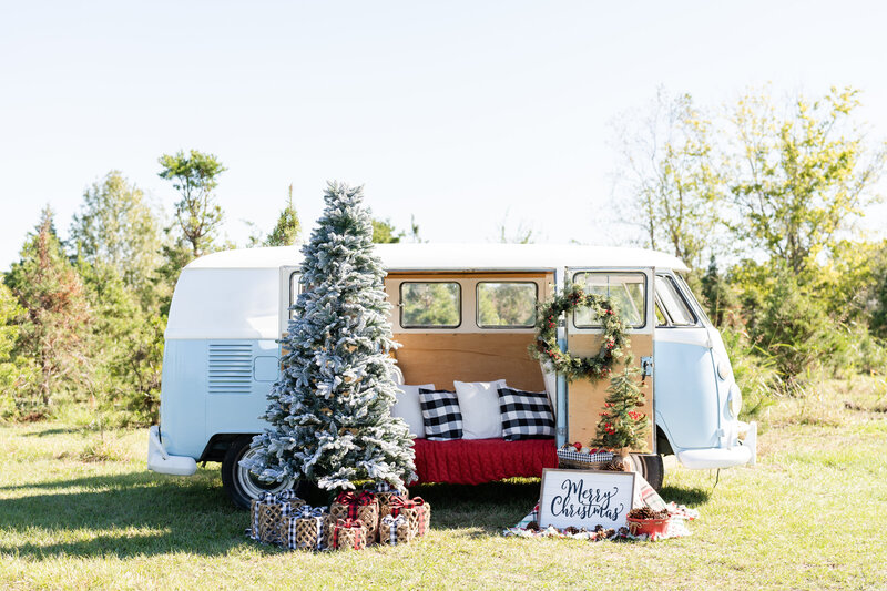 Blue VW bus setup in Christmas decor at Holiday Acres Tree Farm in Manvel, Texas