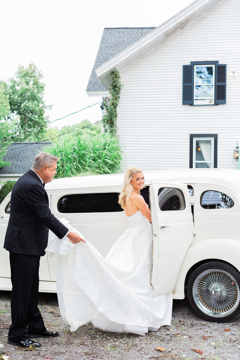 bride and wedding car