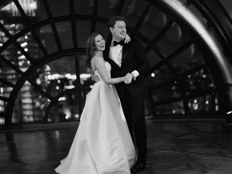 Guest toasting with champagne during the reception celebration.