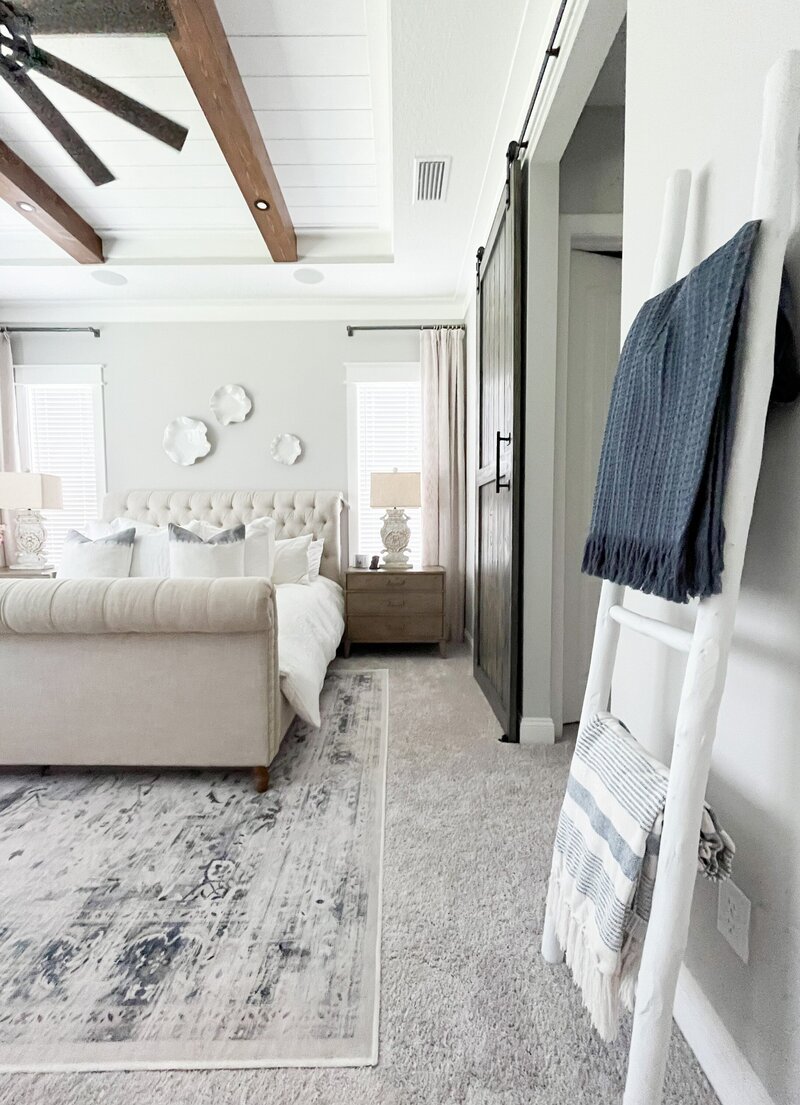 Tranquil bedroom space with luxury linens, calming colors, and custom design touches by Holling Home Interiors.
