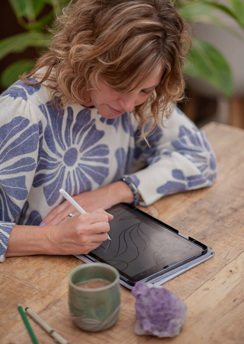 Jaime sketching ideas on an ipad