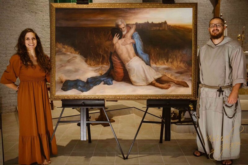 Catholic sacred artist Kate Capato unveils a painting commissioned by Fr. Mark-Mary Ames of the Franciscan Friars of the Renewal