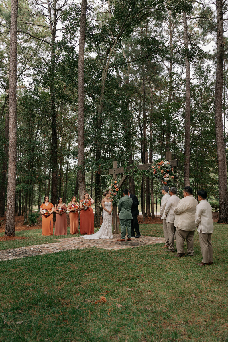 Prayer during a charleston SC wedding at Pineland Place 