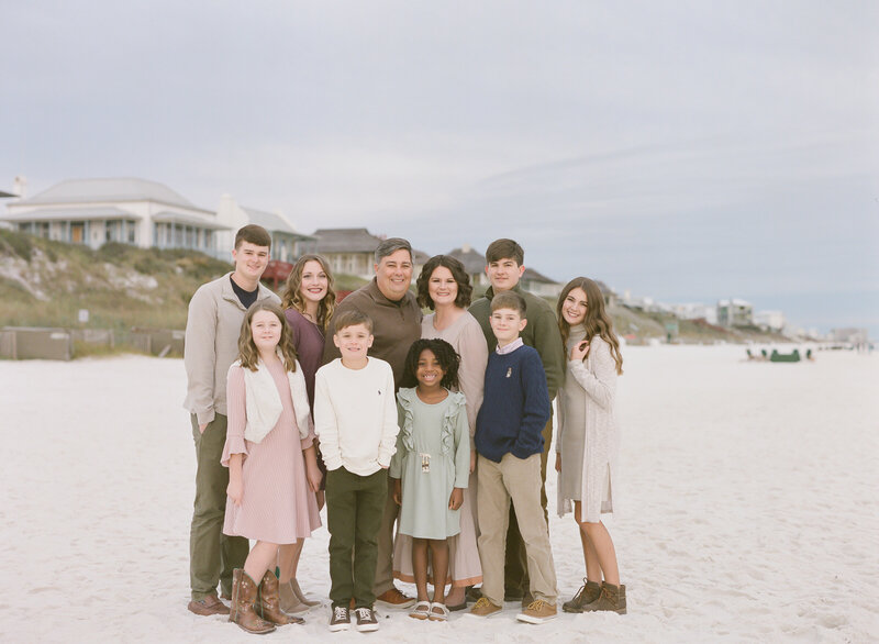 Family photo of children at the beach