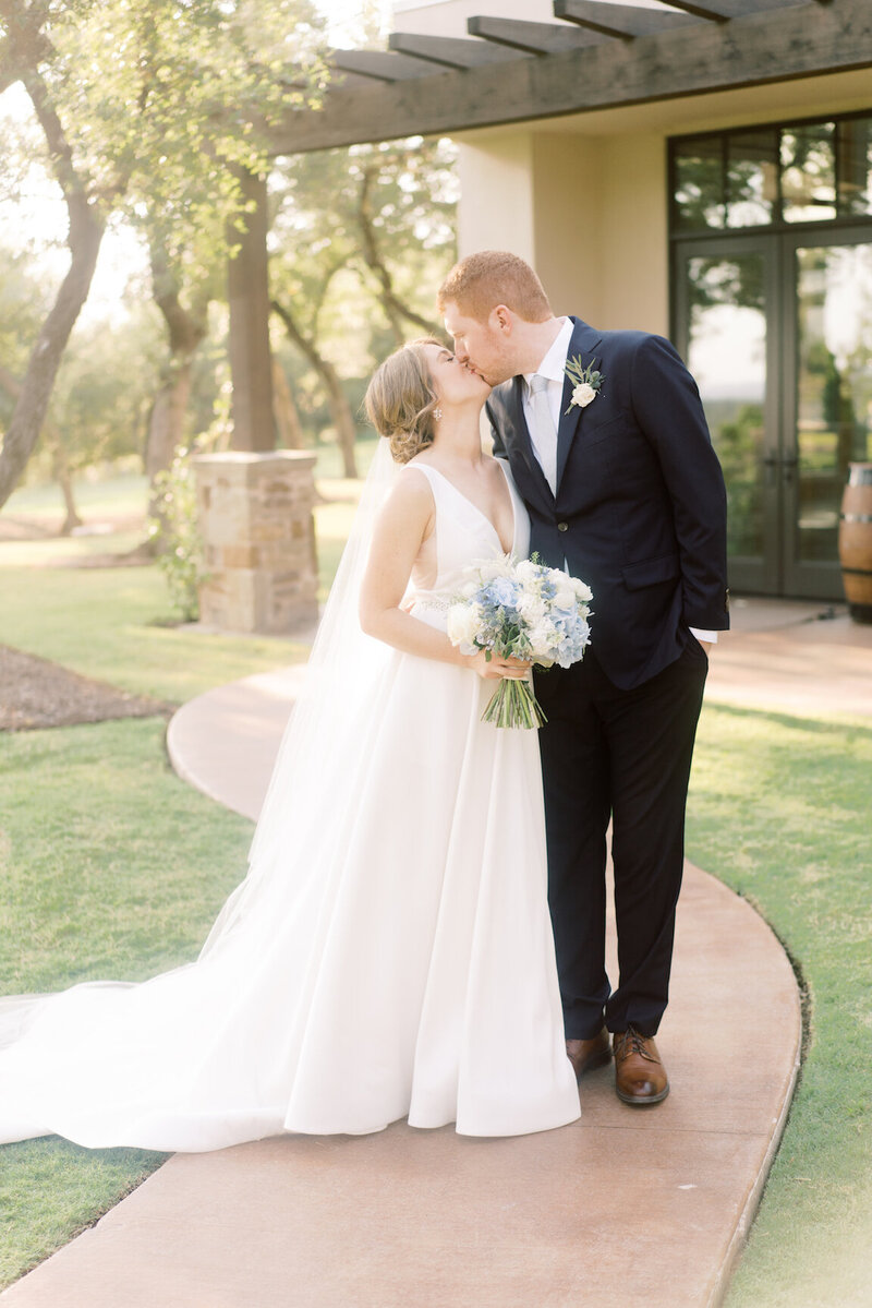 Film wedding photography of couple at Canyonwood Ridge surrounded by oak trees