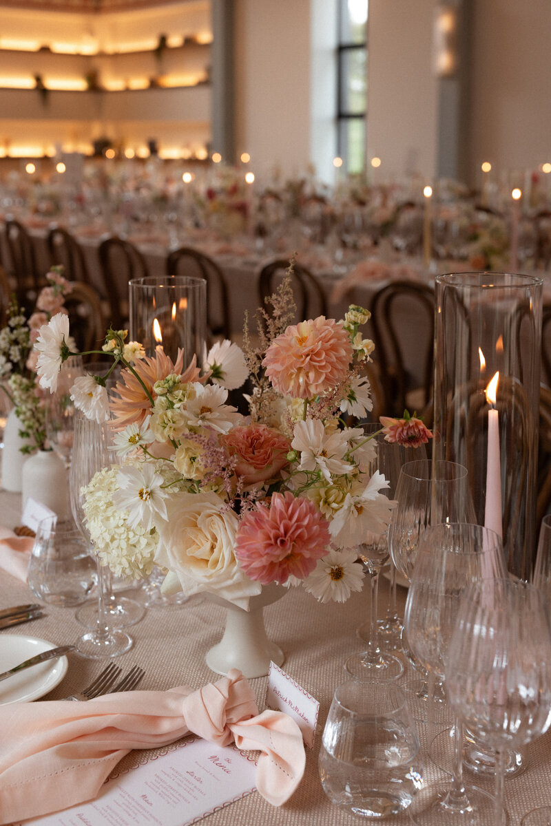 Wedding photographer captures couple taking a stroll hand in hand at their french chateau wedding.