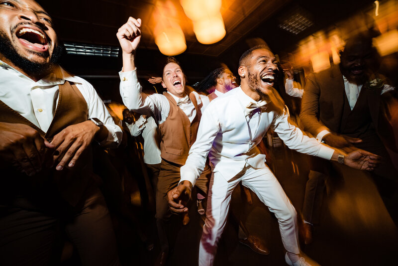 Wedding party dances and sings during the recepion