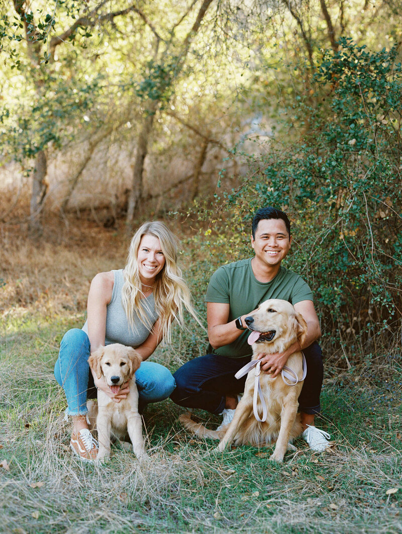 a couple and their two pups