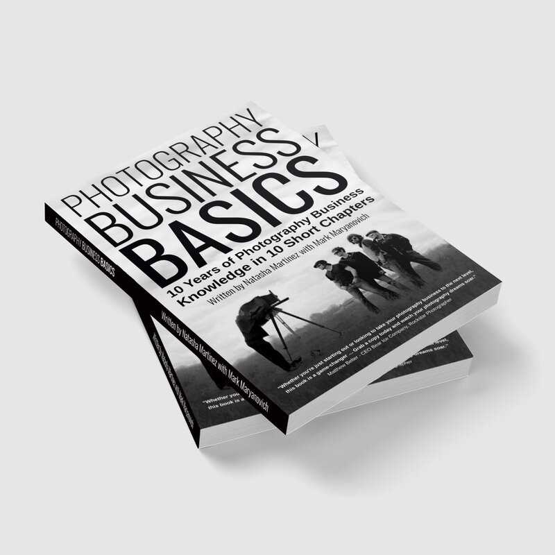 Photography Business Basics two copies stacked at an angle laying flat in black and white