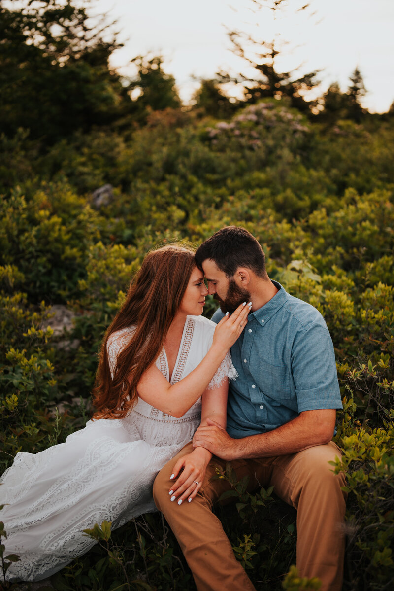 man holding woman from behind