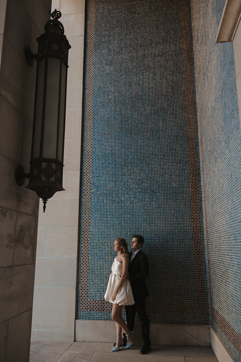 romantic couple for engagement photoshoot in kansas city at liberty memorial