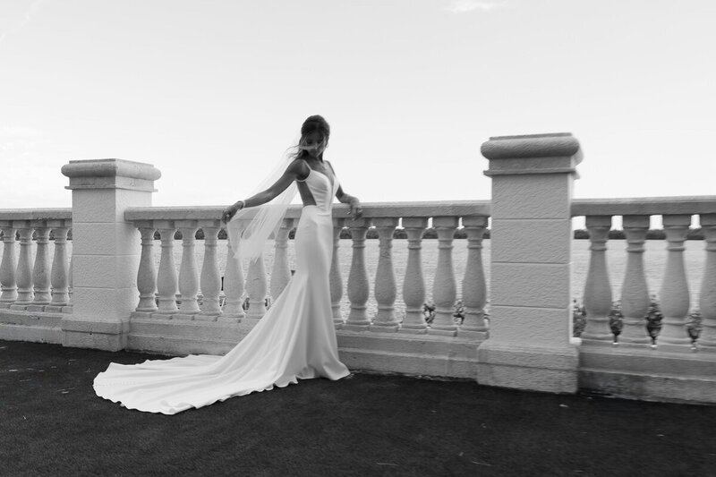 fort myers wedding with bride holding her veil