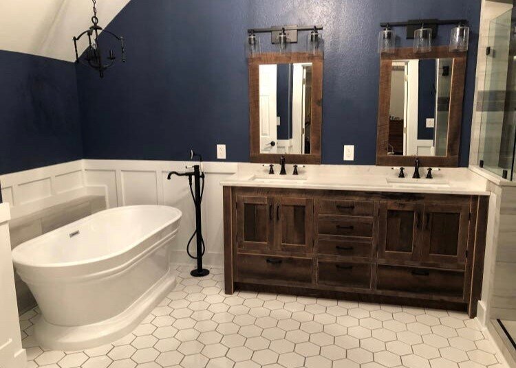 Bathroom with hexigon tile and freestanding tub