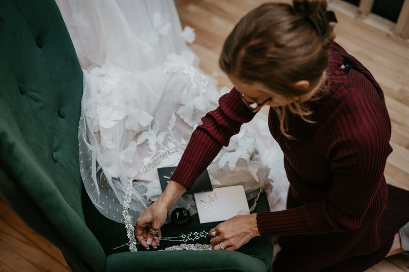 Chelise Boysun photographing a wedding in Glendive, MT, capturing a couple’s intimate moments during their ceremony. Set in the serene Montana countryside, this wedding session highlights the natural beauty of Glendive.