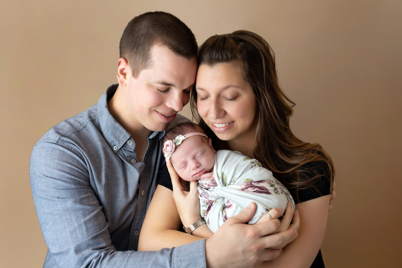 First family portrait taken during studio newborn session in Lavallette, NJ.