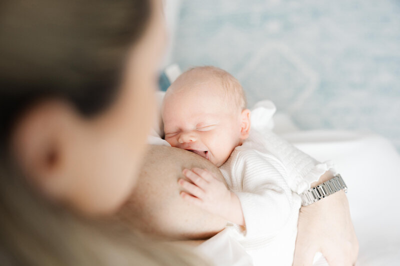 Baby breastfeeding for DC newborn photos