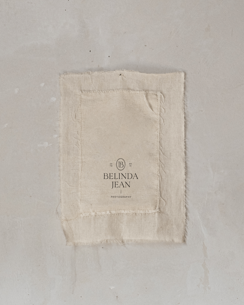 An iPad on linen background.