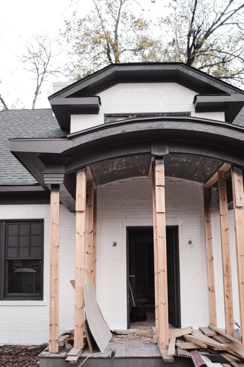 Get ready to fall in love with the stunning exterior of this house that underwent a major renovation. The brick painting and front porch rebuilding gave this home a whole new look and feel. The classic barrel vaulted ceiling adds a touch of elegance and sophistication, while the fresh coat of white paint and dark window paint gave the house a modern facelift. This renovation perfectly combines old-world charm with contemporary design, creating a space that is both timeless and stylish. Whether you're looking for inspiration for your own renovation or simply want to admire the beauty of this breathtaking home, this exterior photo is sure to captivate your heart