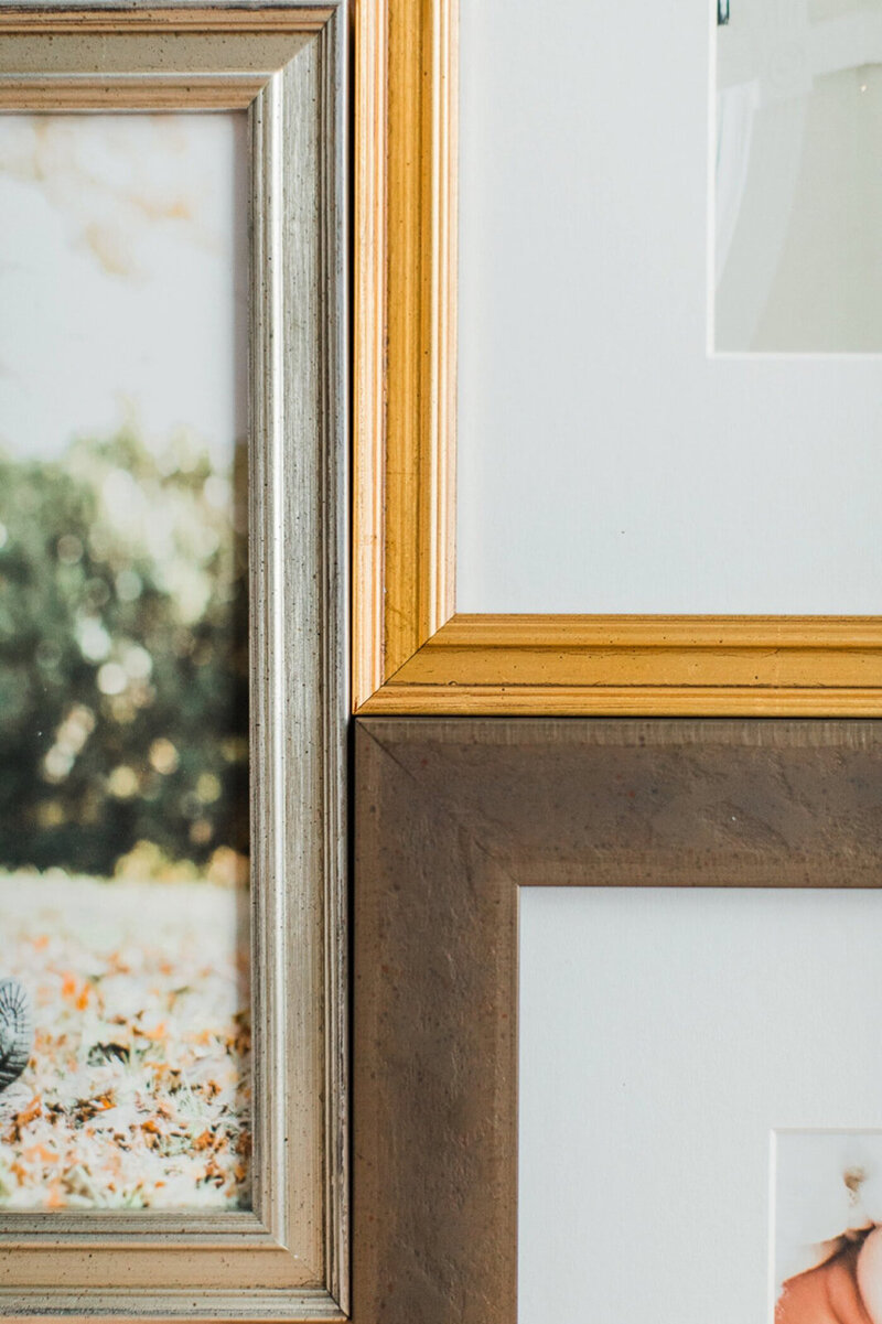 a close up on a mix of gold, silver, and bronze metallic frames
