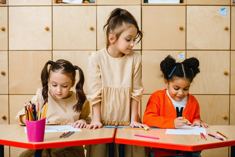 A colorful and welcoming classroom with books, sensory tools, and educational games designed to support children with dyslexia.