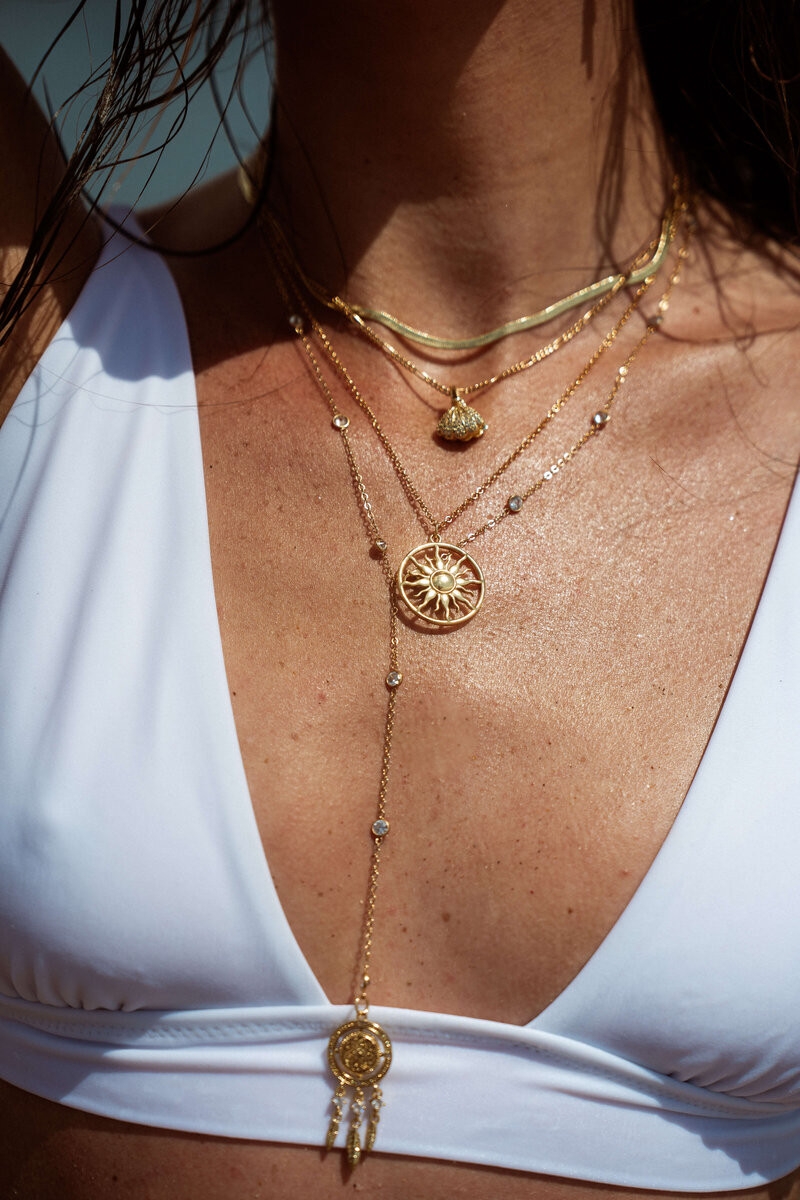 Up close of gold necklaces