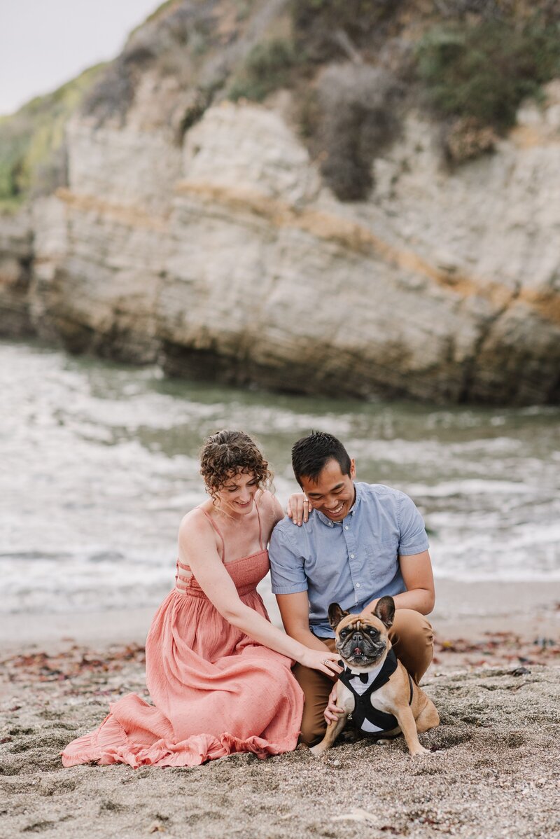 Engagement Photo of couple and dog  at Montana De Oro Spooners Cove