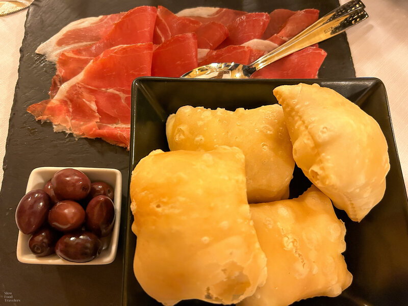 Gnocco fritto with cured meats at Trattoria la Vecchia Guardia in Milan, Italy