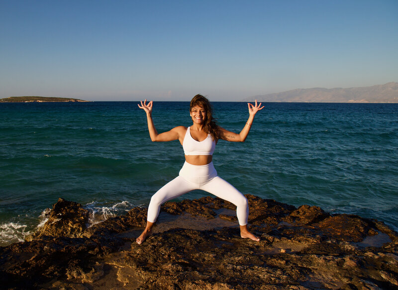 300 Hour Yoga Teacher Training Graduate in Greek Goddess Pose