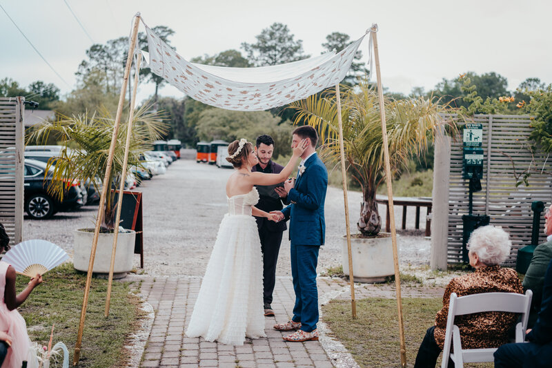 bride wiping grooms tears