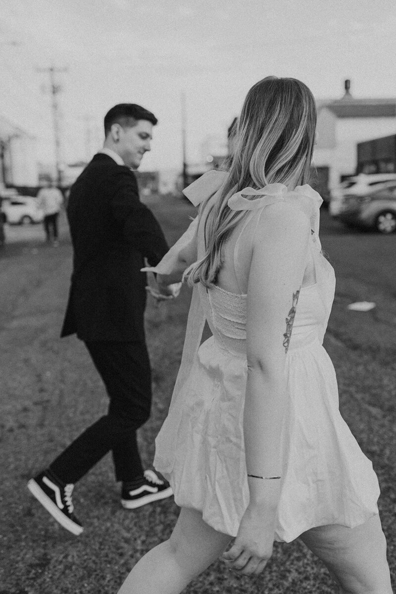 Bride and groom walking in SODO