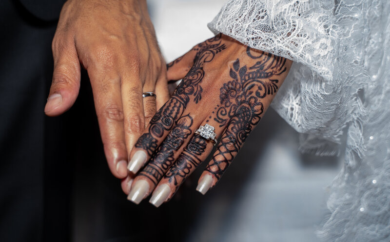 A Somalian couple show off their rings after their wedding.