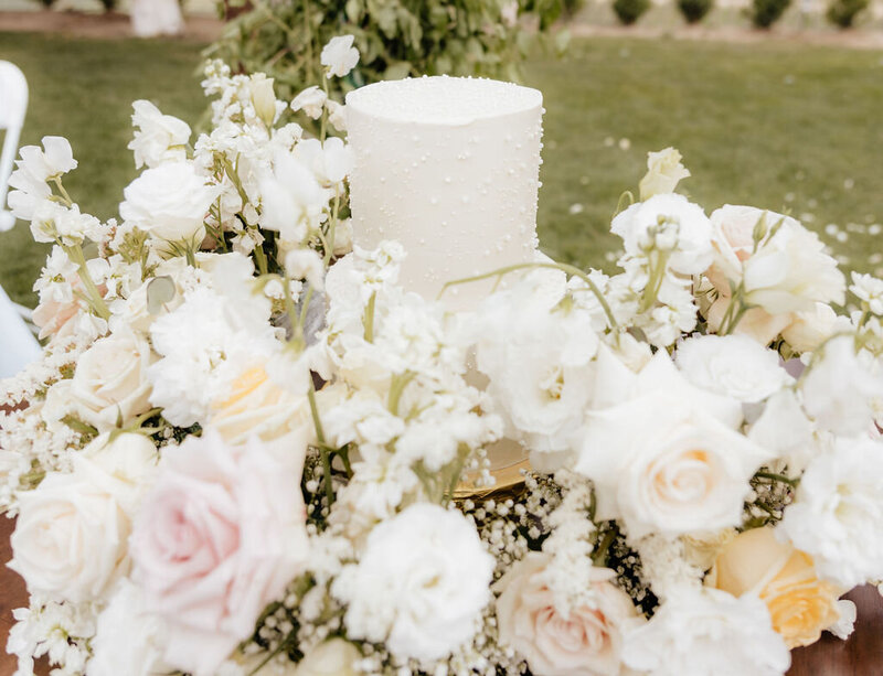 bride and groom embrace at wedding in peoria il