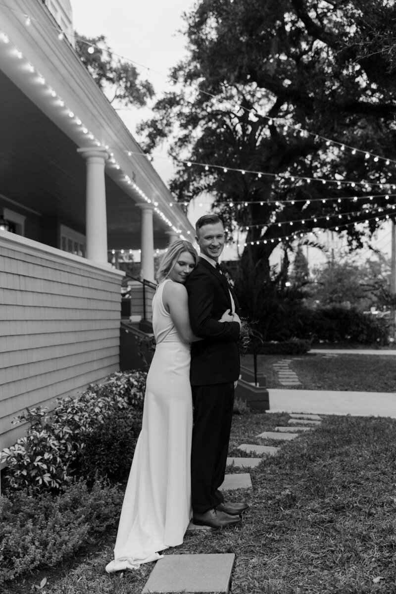 Bride Hugging Groom Intimately
