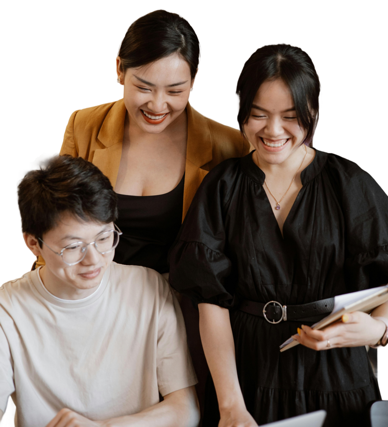 Group of people smiling and working together