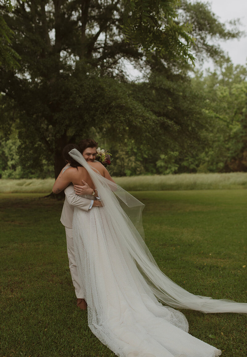 Couple embracing after saying I do at their Georgia based wedding