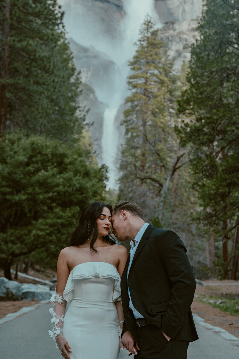 bride and groom at lower yosemite falls