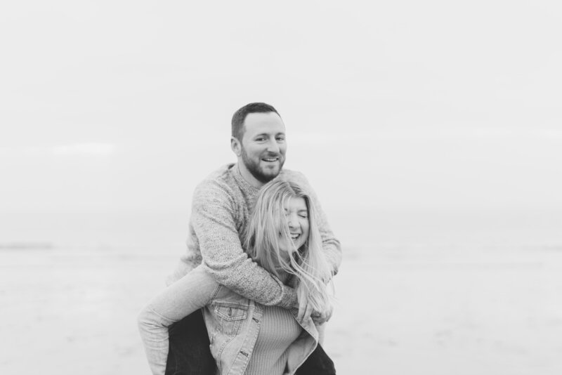 Pre Wedding Shoot couple laughing at beach