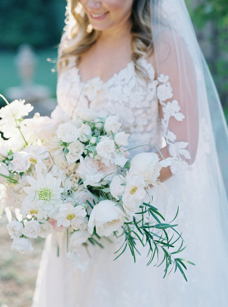 A bride holds a bouquet
