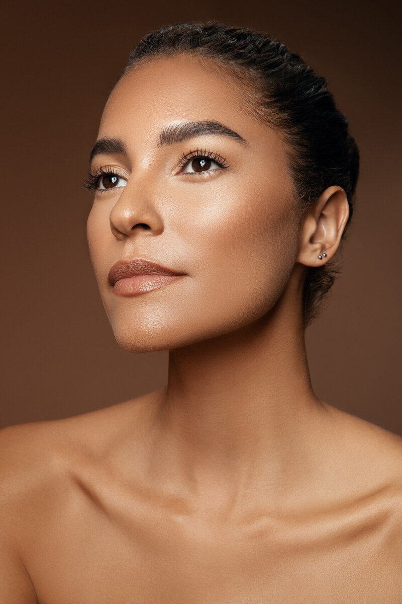 Angelica Artifex in a soft-focus portrait, emphasizing her smooth complexion and gentle expression, captured by Ylva Erevall.