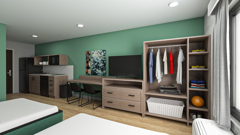 3D Rendering of Double Queen Guest Room showing wall of casegoods for Echo Suites by Wyndham